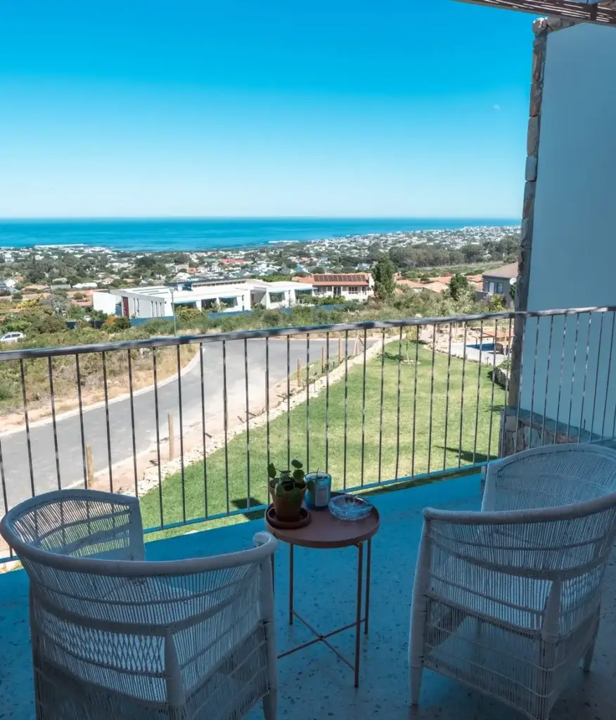 Guest suite balcony with ocean view at Whale Coast Luxury Suites, Onrus